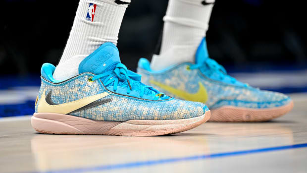 View of blue and grey Nike LeBron shoes.